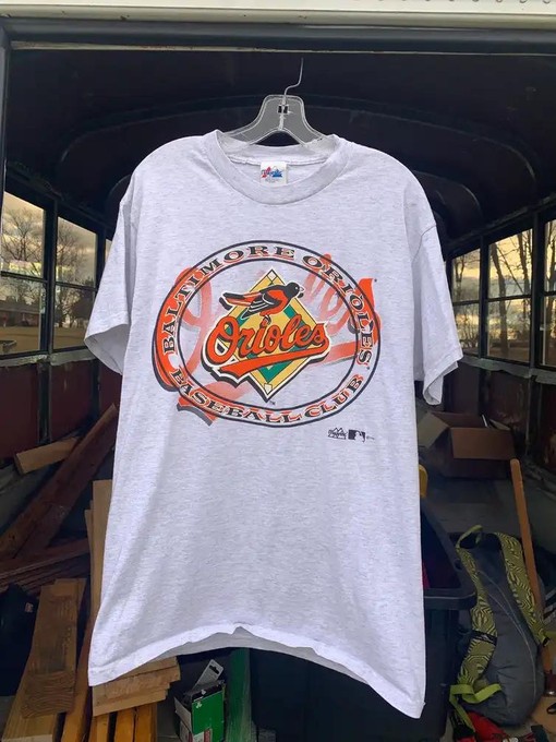 Find Your Throwback Style with This Vintage 1997 Black Cotton Baltimore Orioles T-Shirt, Retro NCAA Shirts