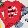 Nebraska Football Long Sleeve Shirt, We Almost Always Almost Win, NCAA Apparel