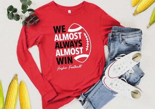 Nebraska Football Long Sleeve Shirt, We Almost Always Almost Win, NCAA Apparel
