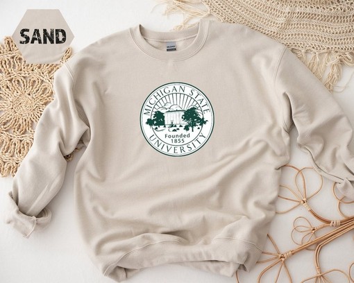 Stay Warm in Style with a Michigan State Sweatshirt, Perfect Gift for College Students with Vintage NCAA Shirts